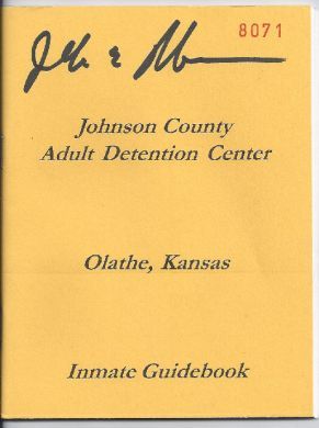 John E. Robinson THE SLAVEMASTER - Signed copy of Johnson County Detention Center Inmate Handbook